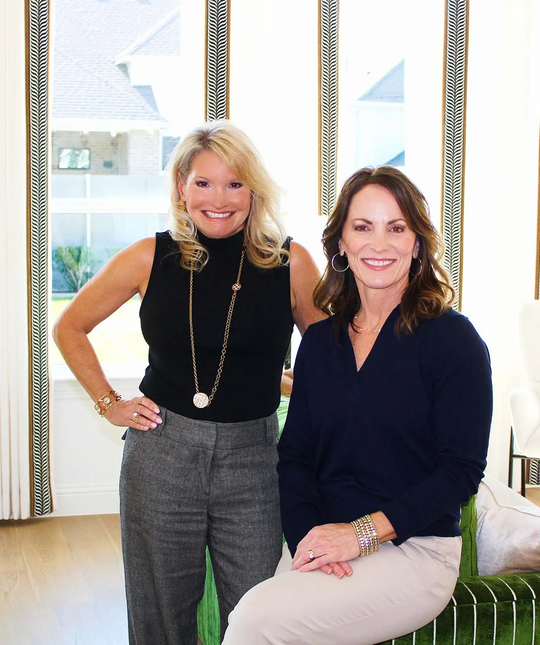 Kim McKinnon and Denise Lamanna f McKinnon Real Estate Group